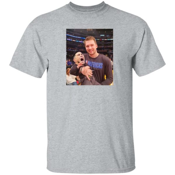 Juju Luka Doncic Carrys Devin Booker Baby Shirt Nocontextees Luka Doncic Carrying Devin Booker Crying Baby Picture Tee Shirt