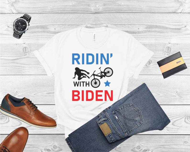 Joe Biden falls off his bike Ridin’ with Biden shirt