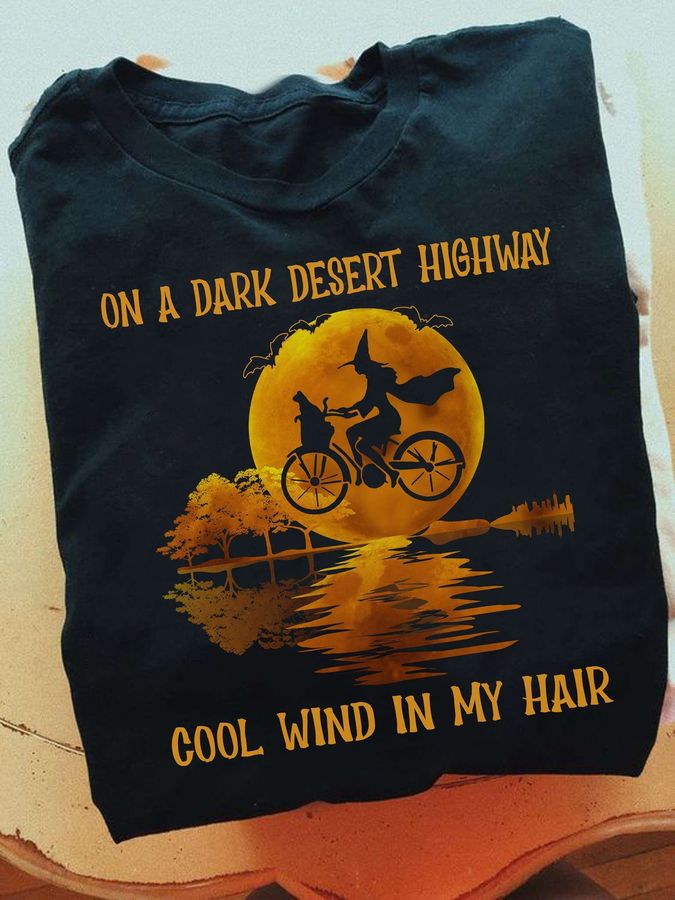 On a dark desert highway cool wind in my hair – Halloween witch biker, witch riding bicycle