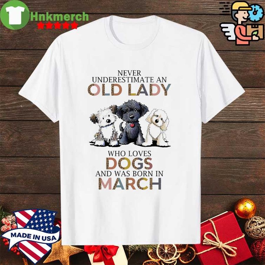 Top Never underestimate an old Lady who loves dogs and was born in March shirt